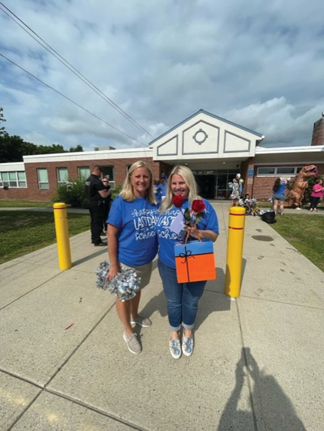DYNAMIC DUO: Winsor Hill School Principal Dr. Amy Burns (right) and Health/Physical Education Teacher Susan Parillo during last week’s special send-off for some nearly 400 students.